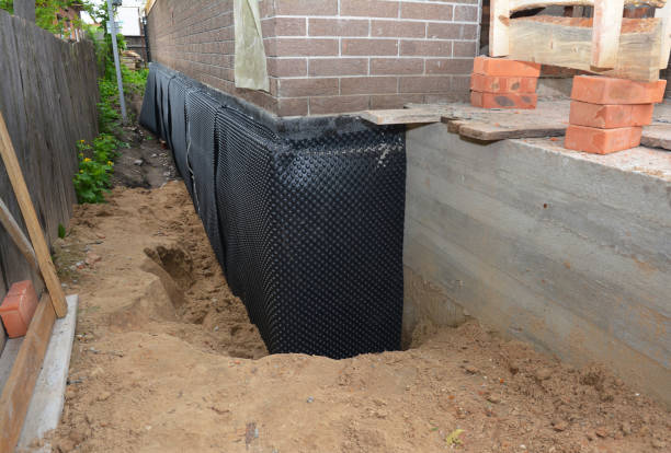 SJ Waterproofing Pros technician performing targeted Interior Drainage System assessment in Colmar, PA